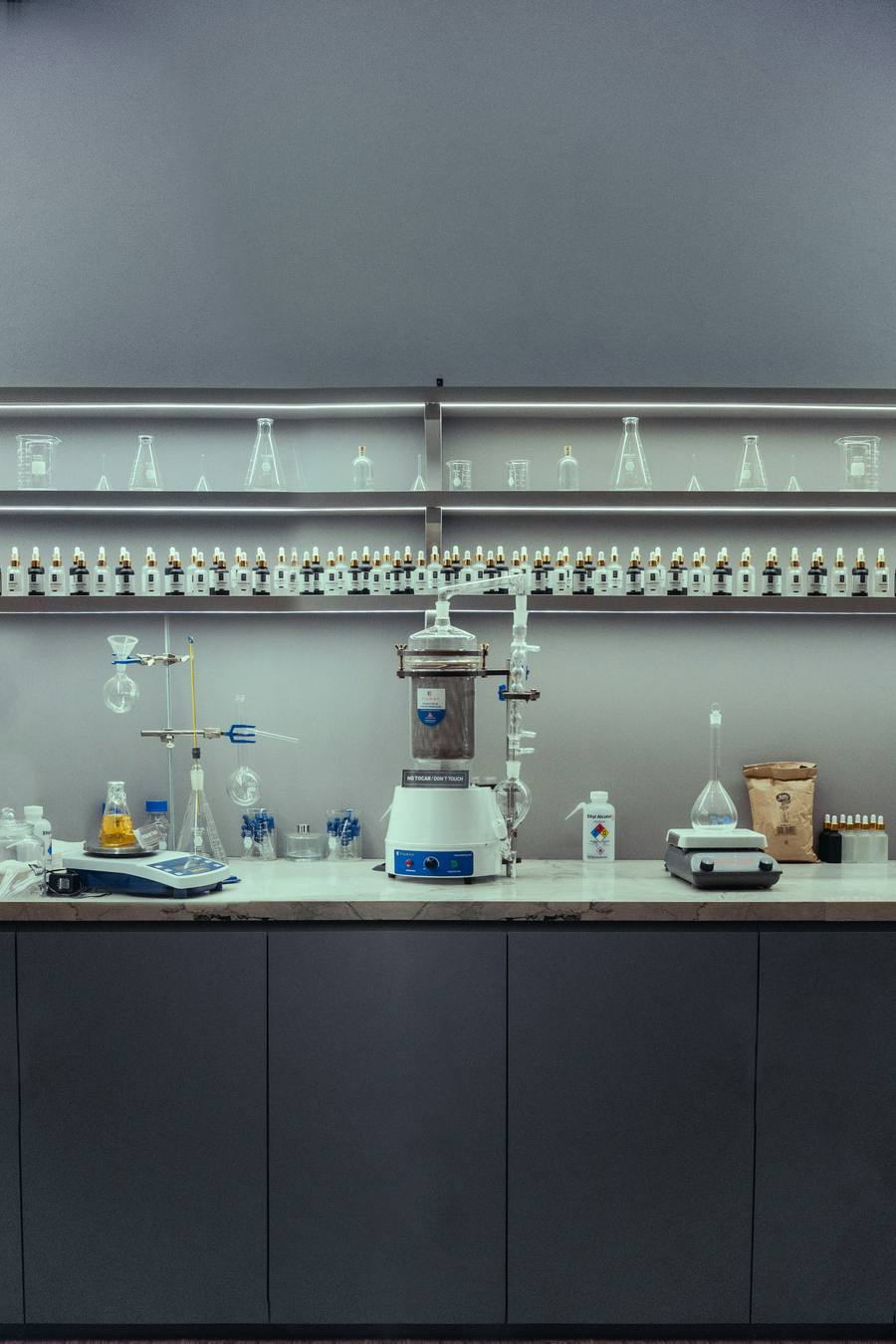 Extraction lab bench with glassware and equipment