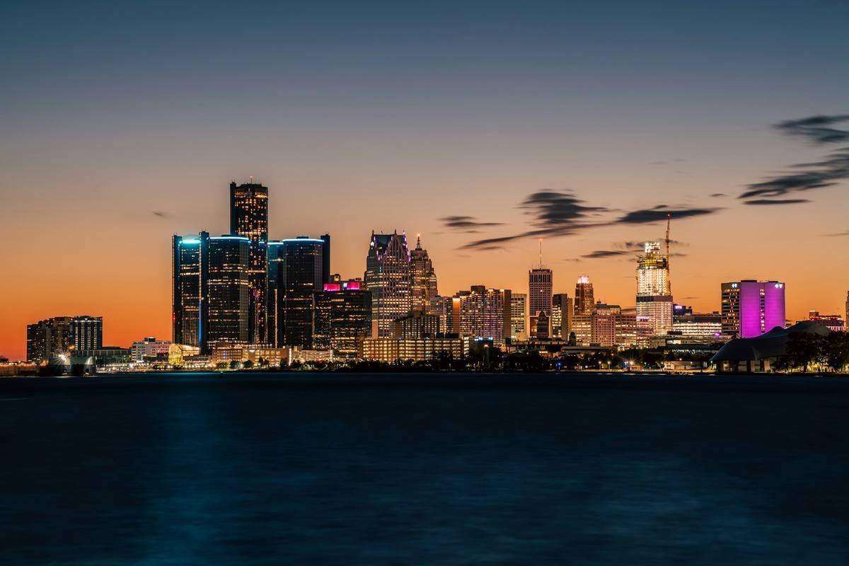 Detroit skyline across the river at dusk